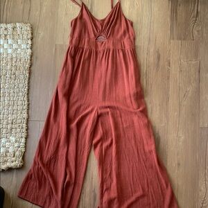 Red Sleeveless Jumpsuit with V-Neckline and Wide-Leg Design